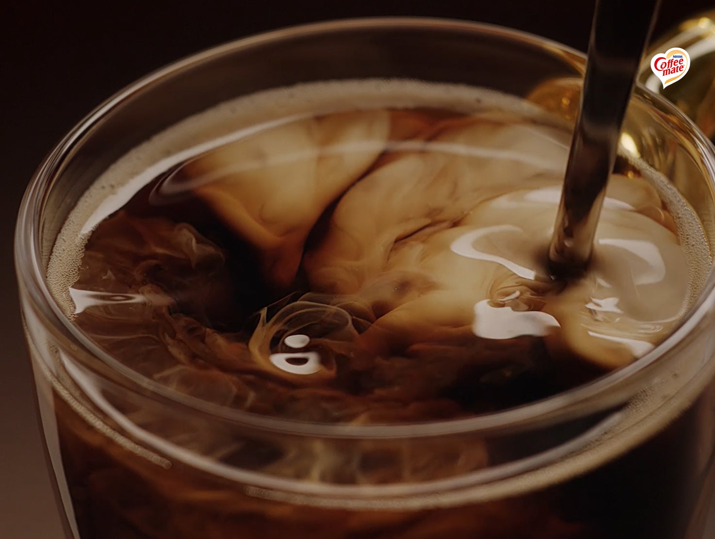 cup of coffee with creamer