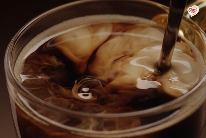 cup of coffee with creamer