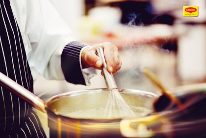 Chef stirring pot